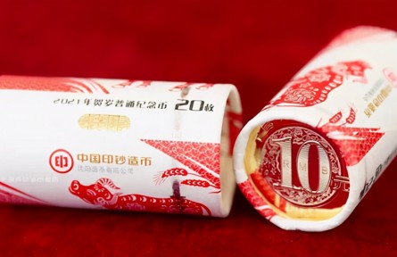 雅而尚礼、文无失秀的《牛运同福》卷筒装贺岁片牛商品流通币